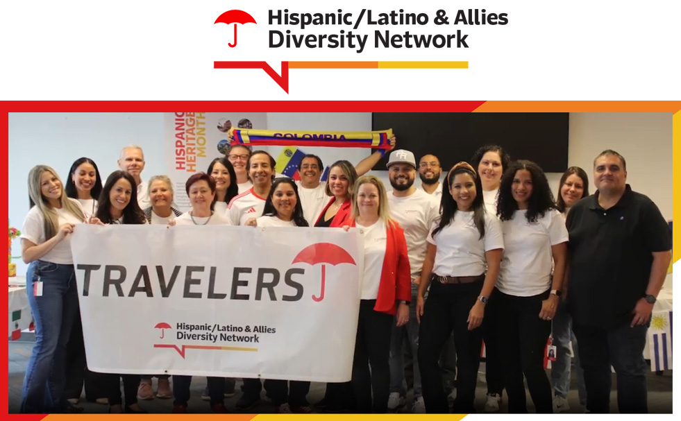 Hispanic Latino & Allies Diversity Network. Group of employees holding a Travelers banner at an event.