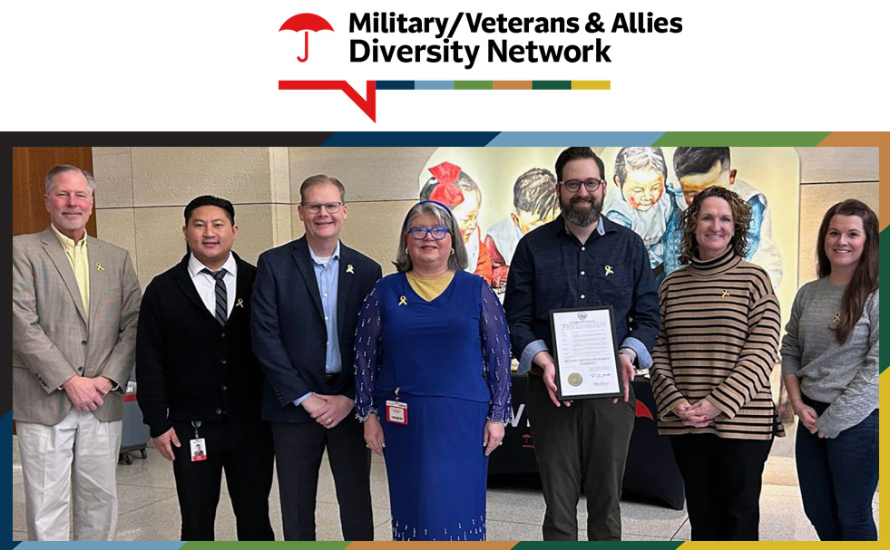 Military/Veterans & Allies Diversity Network. Group of employees at an event.